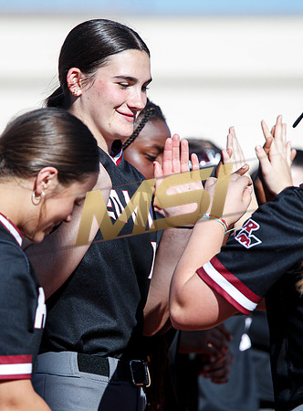The  Red Mountain girls softball team take on the Basha Bears