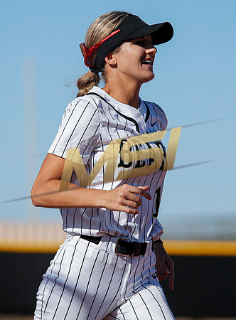 The  Red Mountain girls softball team take on the Basha Bears