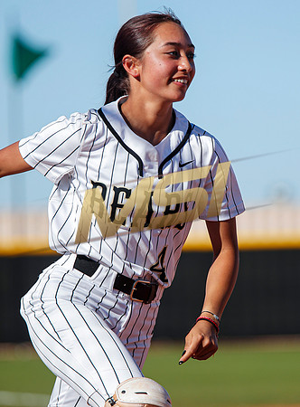 The  Red Mountain girls softball team take on the Basha Bears