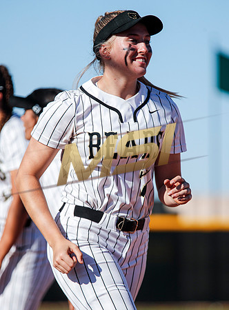 The  Red Mountain girls softball team take on the Basha Bears