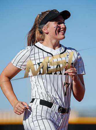 The  Red Mountain girls softball team take on the Basha Bears