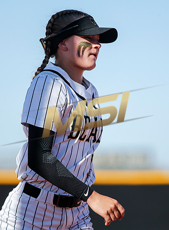 The  Red Mountain girls softball team take on the Basha Bears