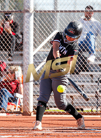 The  Red Mountain girls softball team take on the Basha Bears