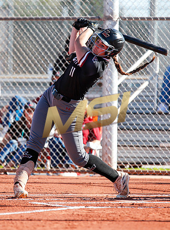 The  Red Mountain girls softball team take on the Basha Bears