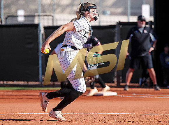 The  Red Mountain girls softball team take on the Basha Bears