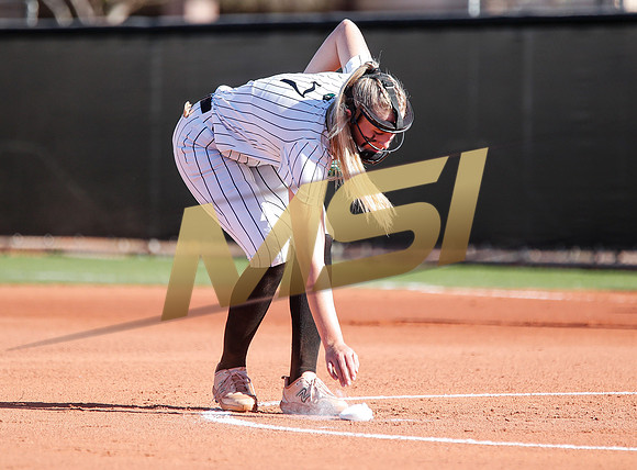 The  Red Mountain girls softball team take on the Basha Bears