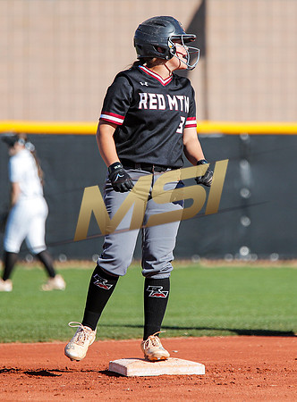 The  Red Mountain girls softball team take on the Basha Bears