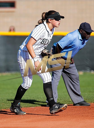 The  Red Mountain girls softball team take on the Basha Bears