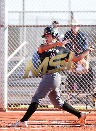 The  Red Mountain girls softball team take on the Basha Bears