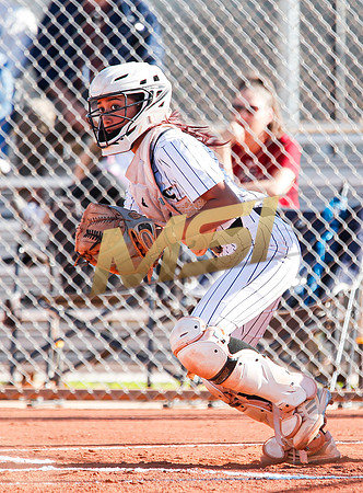 The  Red Mountain girls softball team take on the Basha Bears