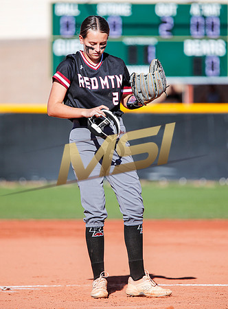The  Red Mountain girls softball team take on the Basha Bears