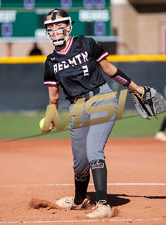 The  Red Mountain girls softball team take on the Basha Bears