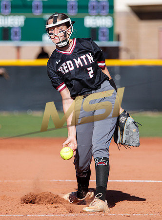 The  Red Mountain girls softball team take on the Basha Bears