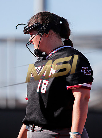 The  Red Mountain girls softball team take on the Basha Bears