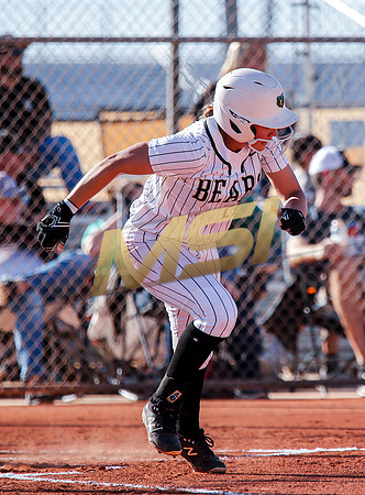 The  Red Mountain girls softball team take on the Basha Bears