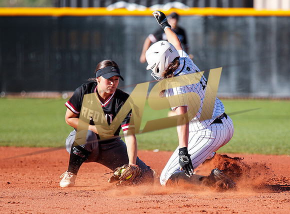 The  Red Mountain girls softball team take on the Basha Bears