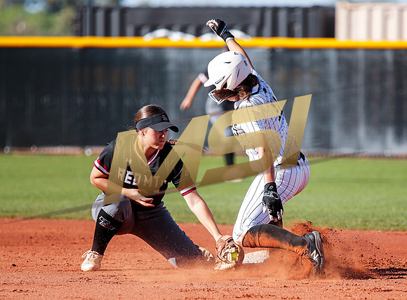 The  Red Mountain girls softball team take on the Basha Bears