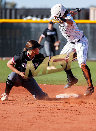 The  Red Mountain girls softball team take on the Basha Bears