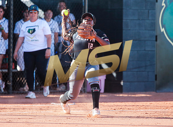 The  Red Mountain girls softball team take on the Basha Bears