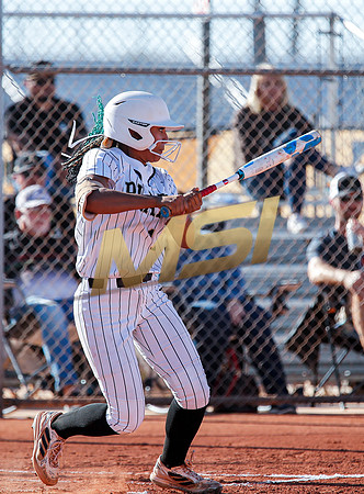 The  Red Mountain girls softball team take on the Basha Bears
