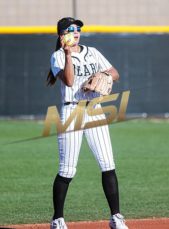 The  Red Mountain girls softball team take on the Basha Bears