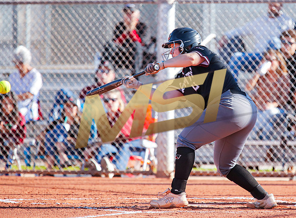 The  Red Mountain girls softball team take on the Basha Bears