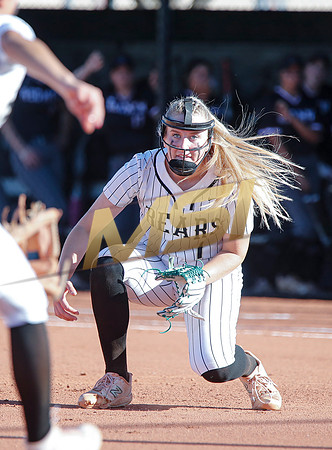 The  Red Mountain girls softball team take on the Basha Bears