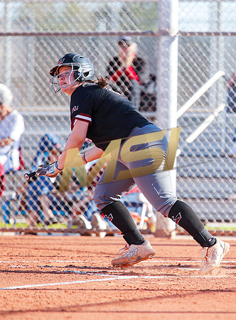 The  Red Mountain girls softball team take on the Basha Bears