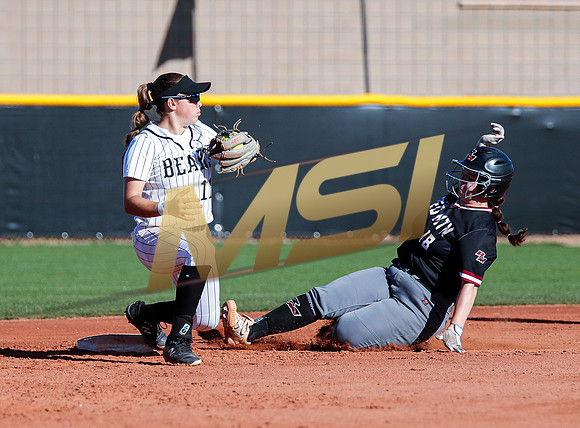 The  Red Mountain girls softball team take on the Basha Bears