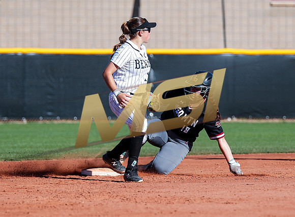 The  Red Mountain girls softball team take on the Basha Bears