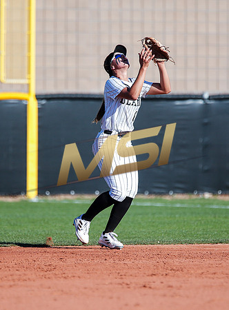 The  Red Mountain girls softball team take on the Basha Bears