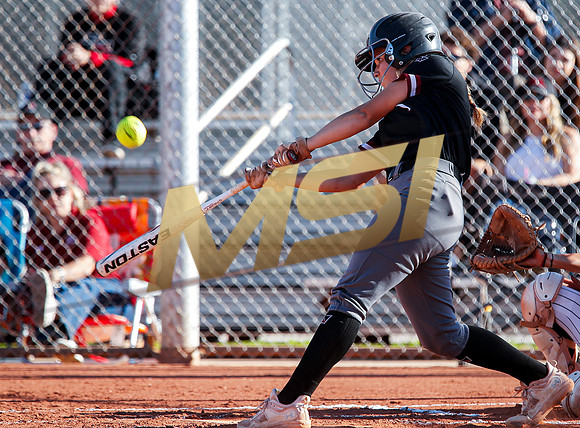 The  Red Mountain girls softball team take on the Basha Bears