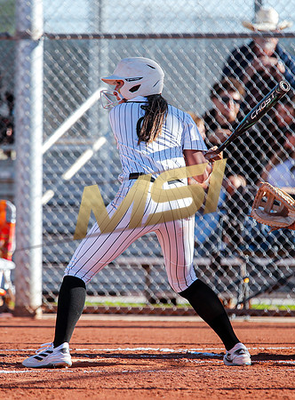 The  Red Mountain girls softball team take on the Basha Bears