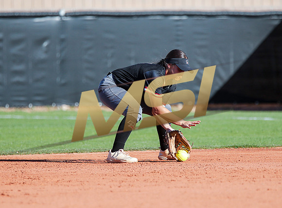 The  Red Mountain girls softball team take on the Basha Bears