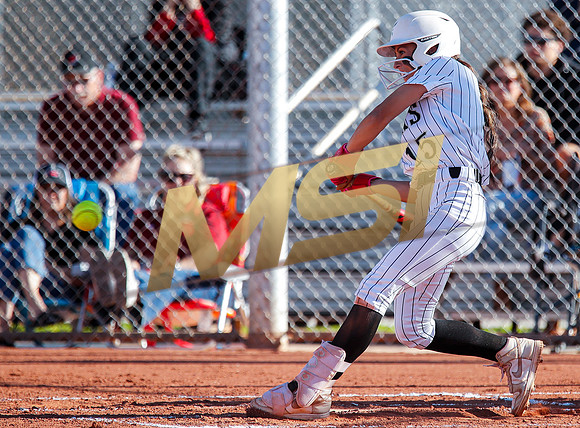 The  Red Mountain girls softball team take on the Basha Bears