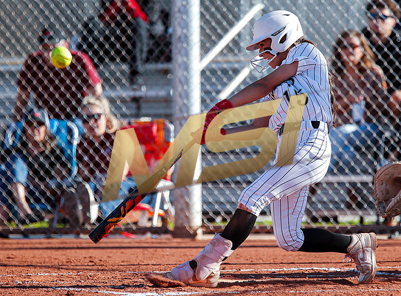 The  Red Mountain girls softball team take on the Basha Bears