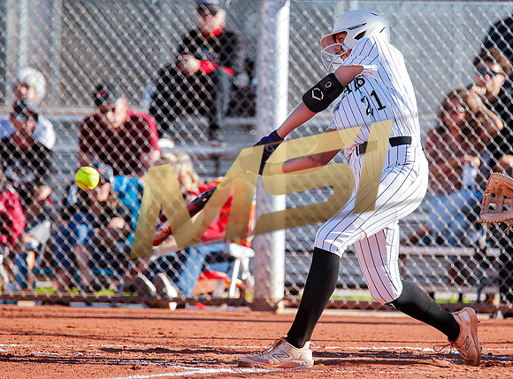 The  Red Mountain girls softball team take on the Basha Bears