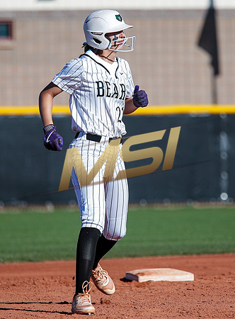 The  Red Mountain girls softball team take on the Basha Bears
