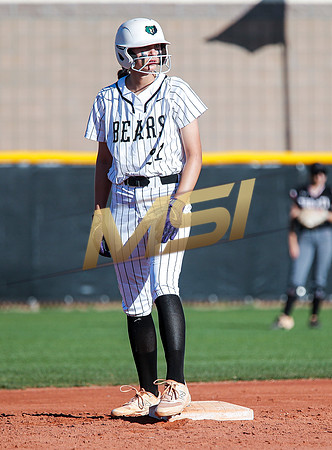 The  Red Mountain girls softball team take on the Basha Bears