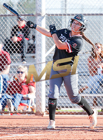 The  Red Mountain girls softball team take on the Basha Bears