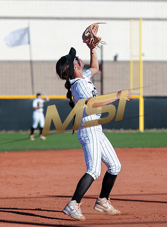The  Red Mountain girls softball team take on the Basha Bears