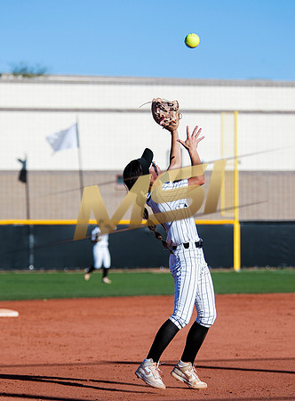 The  Red Mountain girls softball team take on the Basha Bears