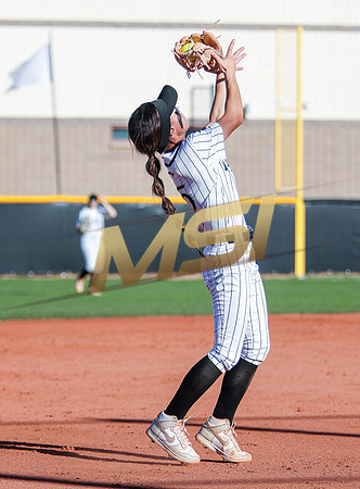 The  Red Mountain girls softball team take on the Basha Bears