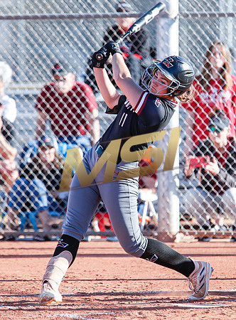 The  Red Mountain girls softball team take on the Basha Bears