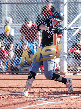 The  Red Mountain girls softball team take on the Basha Bears