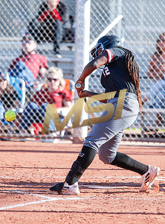 The  Red Mountain girls softball team take on the Basha Bears
