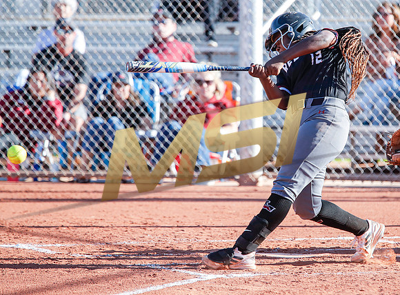 The  Red Mountain girls softball team take on the Basha Bears