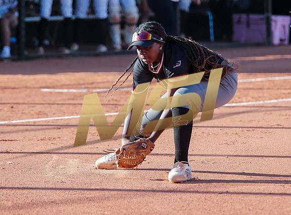 The  Red Mountain girls softball team take on the Basha Bears