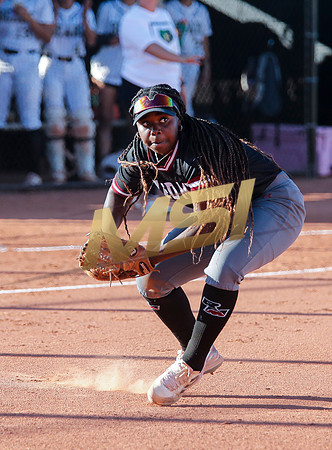 The  Red Mountain girls softball team take on the Basha Bears