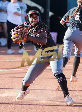 The  Red Mountain girls softball team take on the Basha Bears